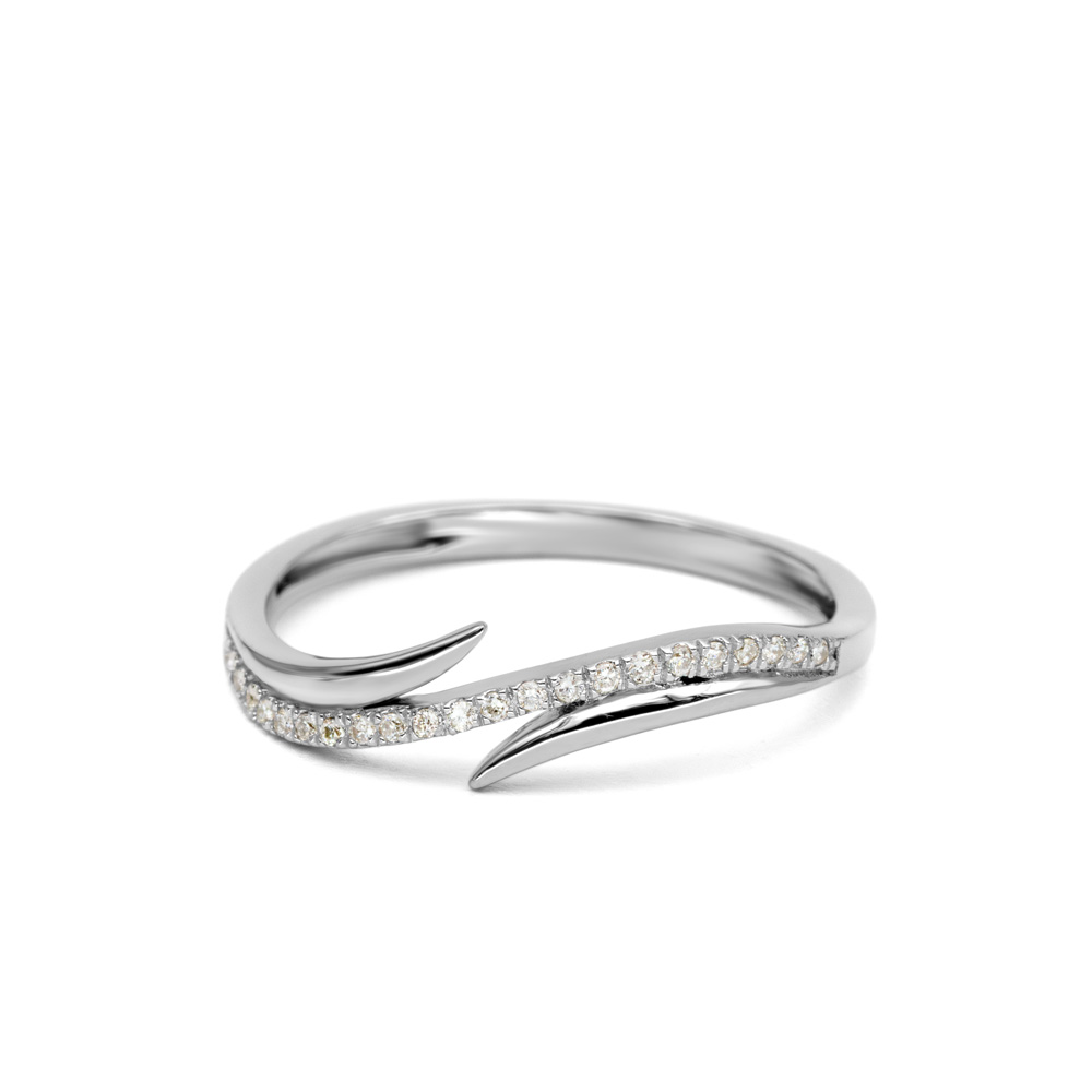 Petrals fehérarany gyűrű aszimmetrikus ívekkel és pavé gyémántsorral, formabontó női dizájnban