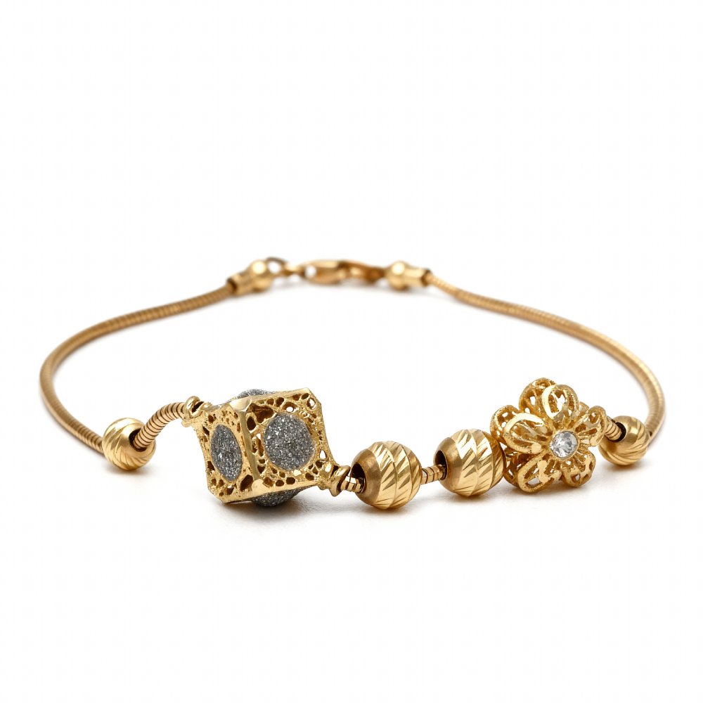 Petrals kubikus cirkónia karkötő sárga aranyból gömb-kocka motívumokkal.