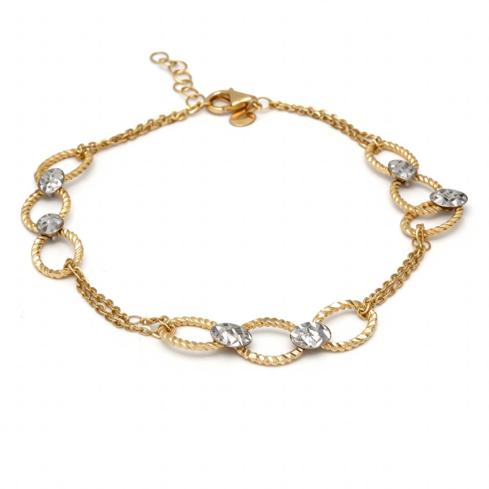 Petrals dupla ovális pavé karkötő sárga aranyból gyémánt láncszemekkel.