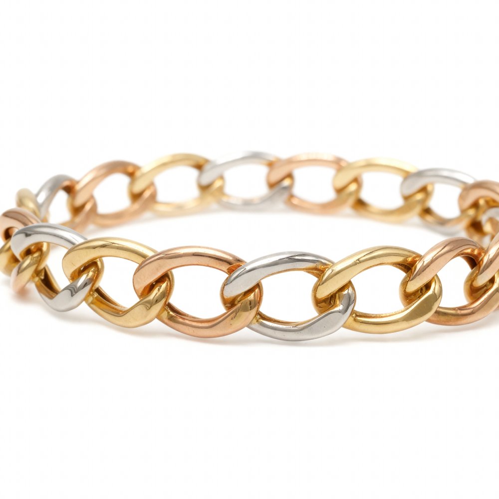 Petrals tricolor fonott karperec sárga-fehér-rozé aranyból harmonikus színátmenettel.