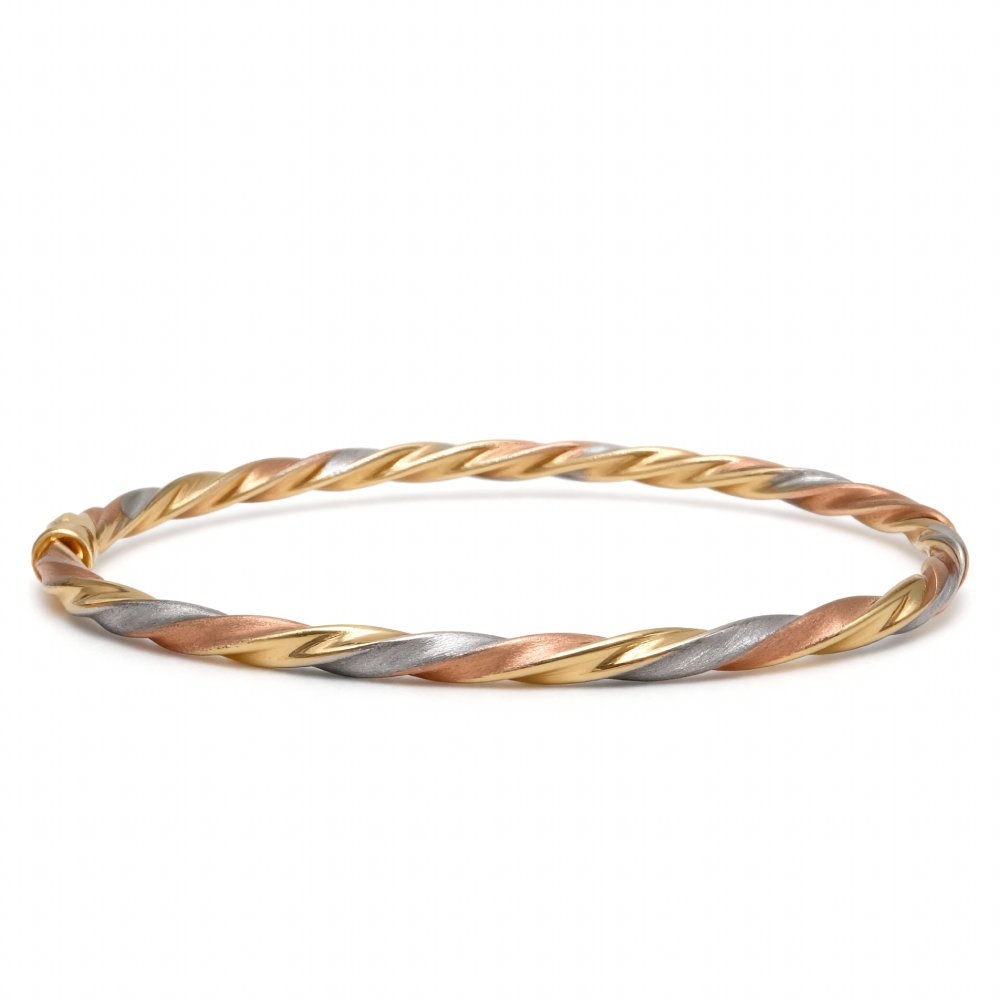 Petrals tricolor örvénylő karperec sárga-fehér-rózsaszín aranyból csavaros fonattal.