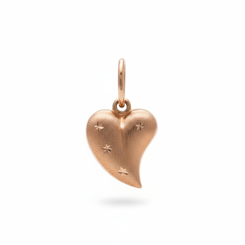 Petrals 14K rozé arany szív medál vésett csillagokkal.